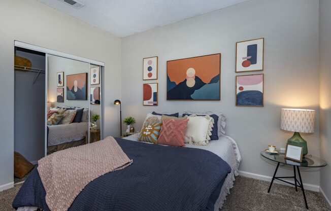 Seasons at Umstead apartments in Raleigh interior renovated bedroom with colorful art