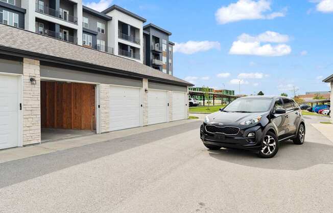 a car is parked in front of a building