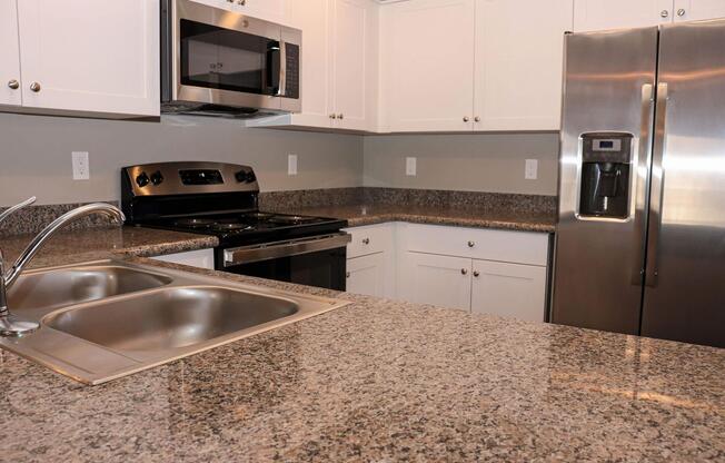 a kitchen with stainless steel appliances