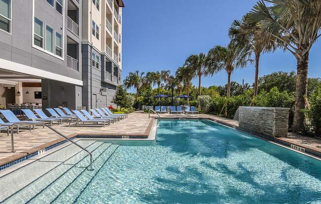 Sun sparkling swimming pool at The Exchange Luxury Apartments in St. Petersburg, FL
