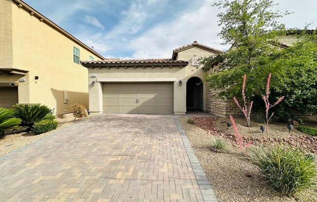 Immaculate Rhodes Ranch Golf Course Community home with a contemporary open floorplan