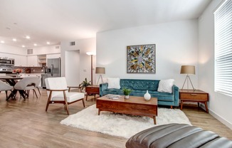Open floorplan with wood-inspired floors throughout