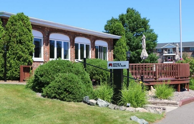 a house with a sign in front of it