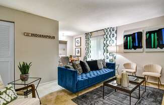 Living room in a 1-bed, 1-bath apartment at Ashton Brook, featuring spacious seating, natural light, and a cozy atmosphere.