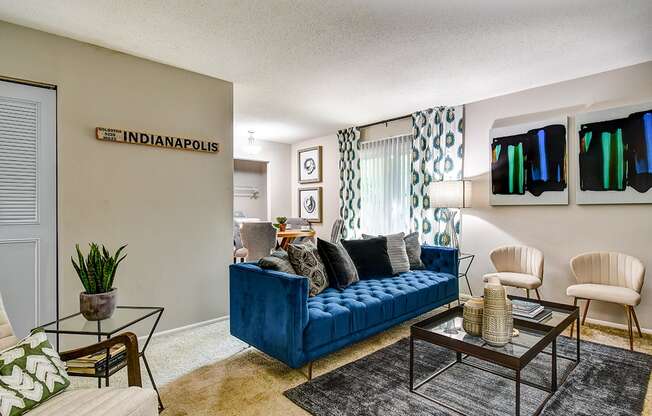Living room in a 1-bed, 1-bath apartment at Ashton Brook, featuring spacious seating, natural light, and a cozy atmosphere.
