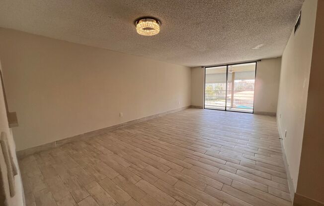 Great unit with pool view, pretty tile flooring.
