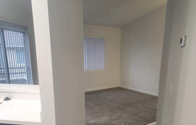 2x2D A white countertop with a stainless steel dishwasher in a kitchen.