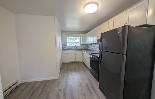 Cute and Cozy, Centrally Located Triplex with Yard