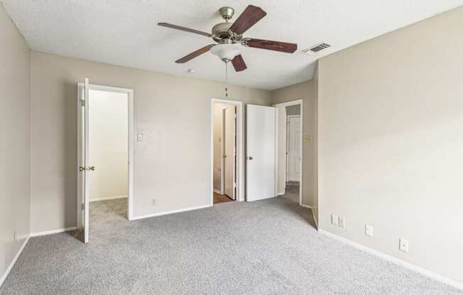 Spacious bedroom with ample natural light at Bandera Crossing apartments in San Antonio, TX