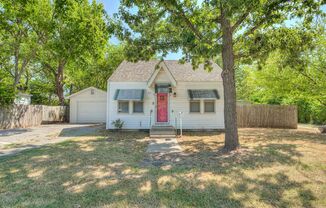 Charming 2 Bed / 1 Bath Home with Detached Garage and Huge Yard