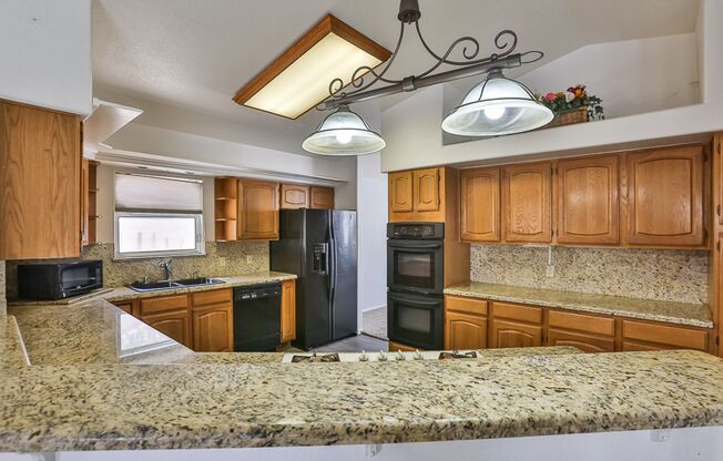 One Story home! 4 beds, pool spa, 3 car garage w/workshop. RV parking. Granite counters