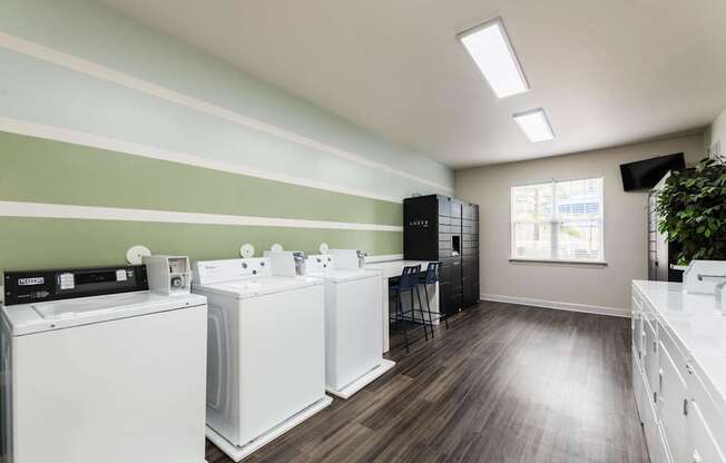 A laundry room with a washer and dryer.