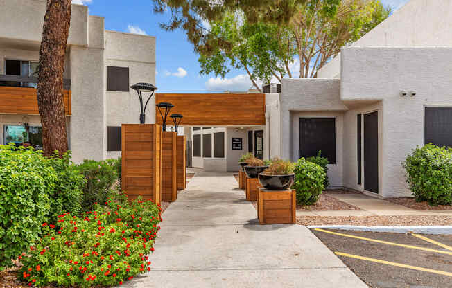 a house with a long walkway in front of it