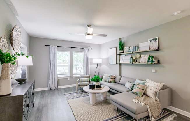 a living room with a couch and a table