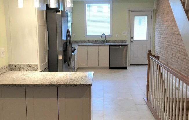 Beautiful 3 Bedroom Renovation in Greektown with Parking Pad