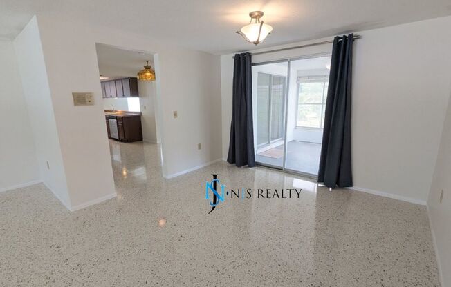 Large open 2/2/1 1378 Sq. Ft. with freshly finished floors, fresh paint, new appliances and located near the heart of Downtown New Port Richey!!