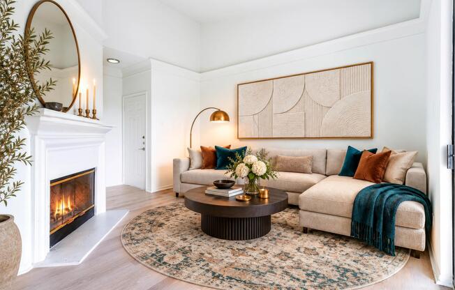 Premium homes feature fireplaces, crown molding, wood-style flooring, and spacious living areas that bring warmth, character, and comfort to the home.