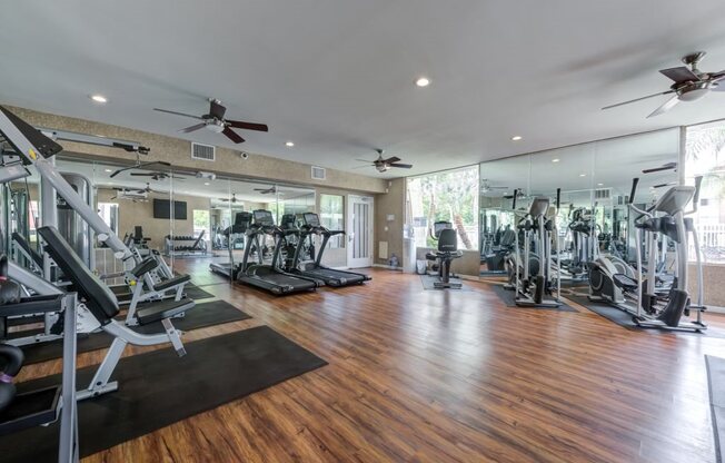Woodland Hills, CA Apartments for Rent - Reserve at Warner Center Fitness Center with treadmills, ellipticals, free weights, and more