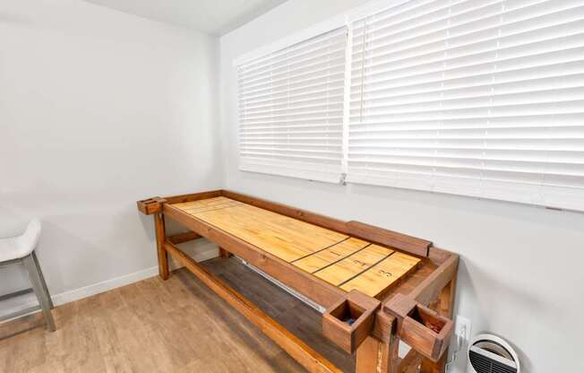 Resident lounge game area at Rock Creek Apartments in Billings, MT.