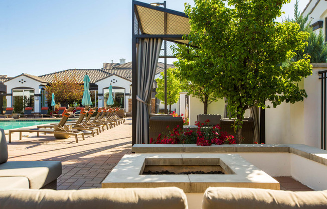 Outdoor Lounge With Firepit at SkyStone Apartments, Albuquerque