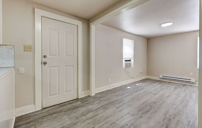 Charming Home Near Midtown: Wood Flooring and Prime City Access! Available now!