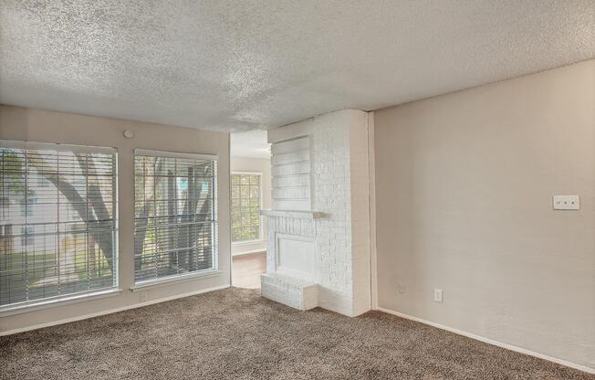 a room filled with furniture and a large window