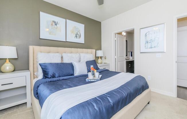 a bedroom with a bed in a room