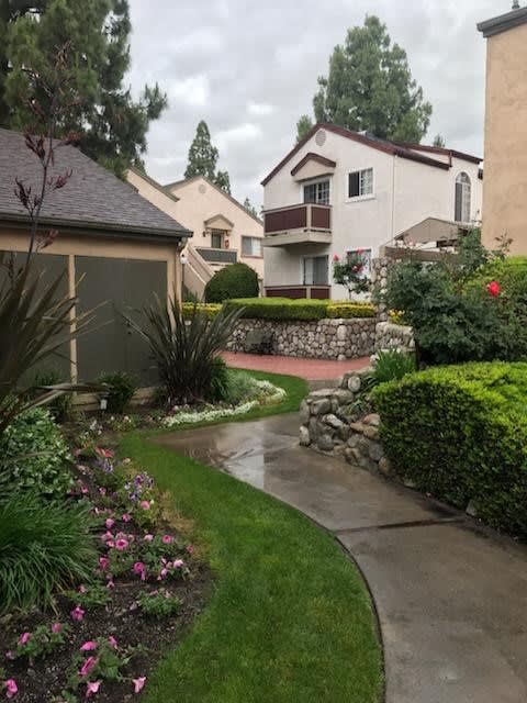 Elegant pathways between buildings at Northwood Apartments in Upland, California.