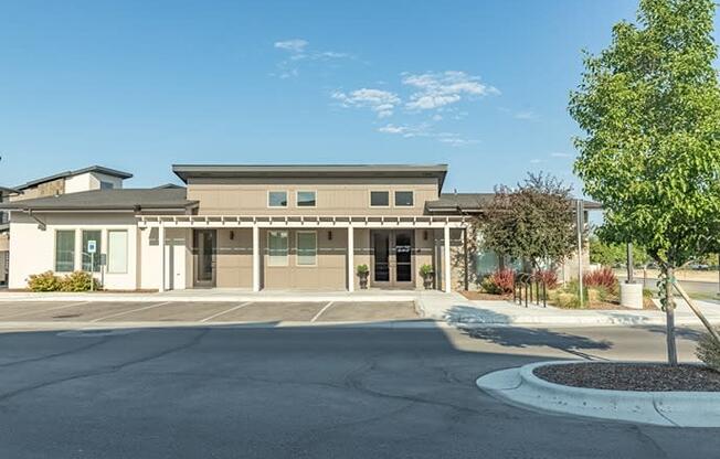 a view of the front of the building from the parking lot