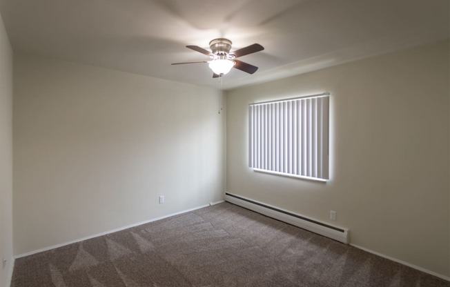 This is a photo of the second bedroom of the 1004 square foot, 2 bedroom/1 bath Townhome with stackable washer/dryer floor plan at Colonial Ridge Apartments in the Pleasant Ridge neighborhood of Cincinnati, OH.