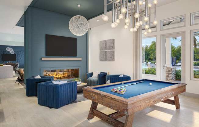 a clubhouse with a pool table and a television