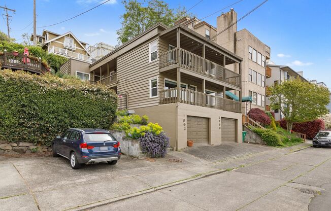 Queen Anne water view 3 bed 2 bath with den and 2 parking spaces