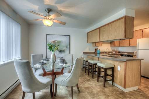 Dining And Kitchen at Woodcreek Apartments, Fairview
