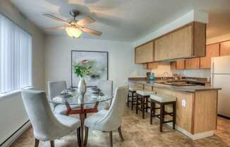 Dining And Kitchen at Woodcreek Apartments, Fairview