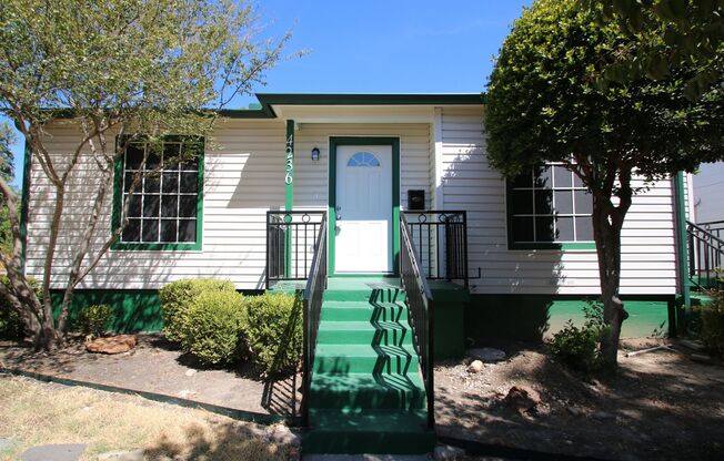 2/1 Bungalow style House in FABULOUS Fort Worth neighborhood ~ Hardwood Wood Floors All Throughout ~ Abundance of Natural Light! ~  Granite Countertops w/ Stainless Steel Appliances in Kitchen ~ MOVE-In READY!