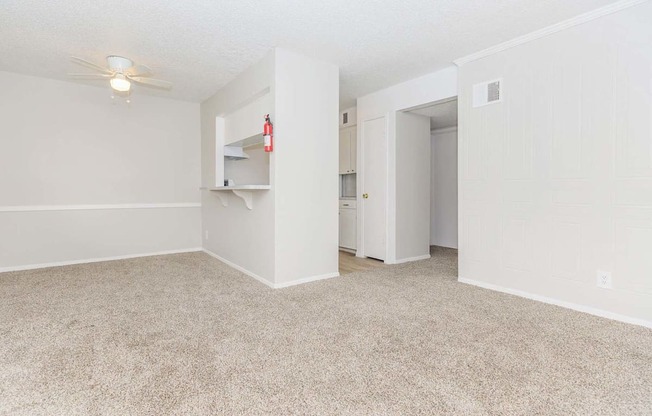 Carpeted Living Area at Castlewood Apartments, Clute, TX