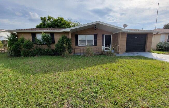 BEAUTIFUL 2/1/1 864Sq. Ft. with tile/wood floors, spacious kitchen and enclosed screened porch!