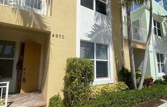 Lovely three bedroom, two and half bath town home located in the gated Centra community of Boca Raton.