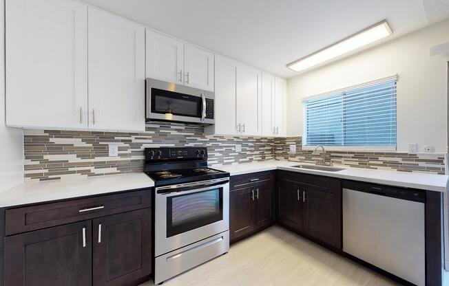 a kitchen with a stove top oven