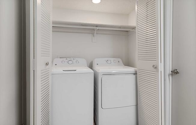 a washer and dryer in a laundry room