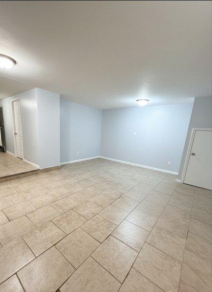12009 FARMERS BLVD