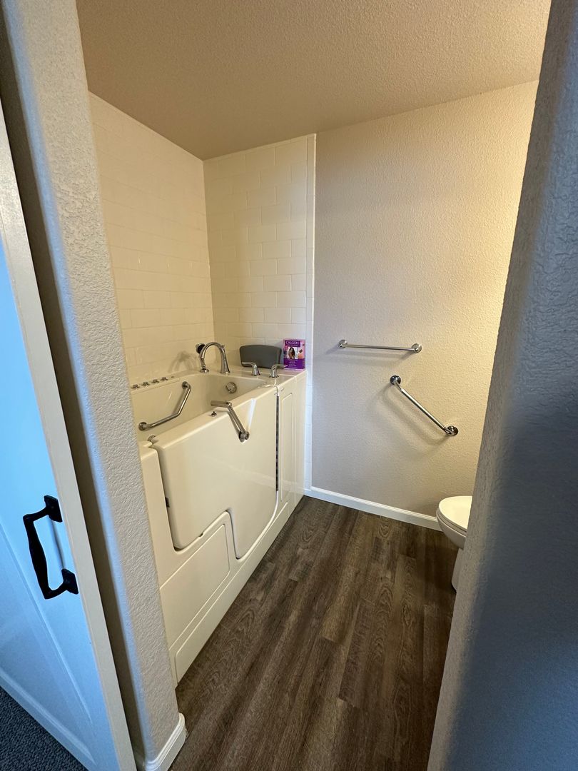 2 BEDROOM, PLUS OFFICE SPACE, 2 BATHROOM, SINGLE LEVEL TOWNHOME WITH 2 CAR ATTACHED GARAGE