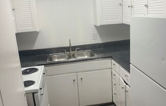 Spanish Stone Apartments