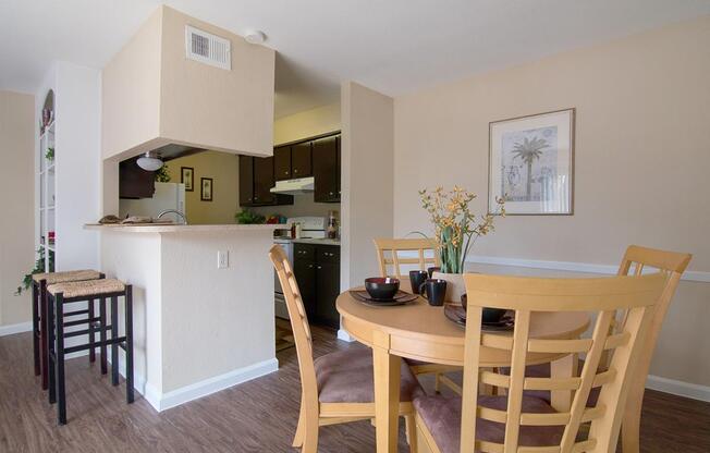 a kitchen with a dining room table