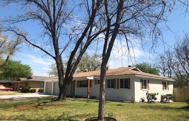 Custom Remodeled Home on a Tree lined street in Benbrook!!  Bonus Room could be game room extra living room!!