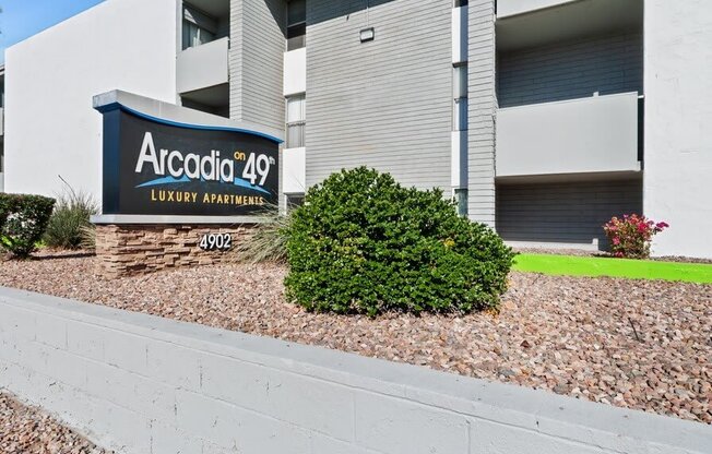 Property entrance sign and buildings