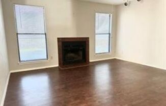 First-Floor 2BR/2BA Condo in Plano with Fireplace + 2 Carports
