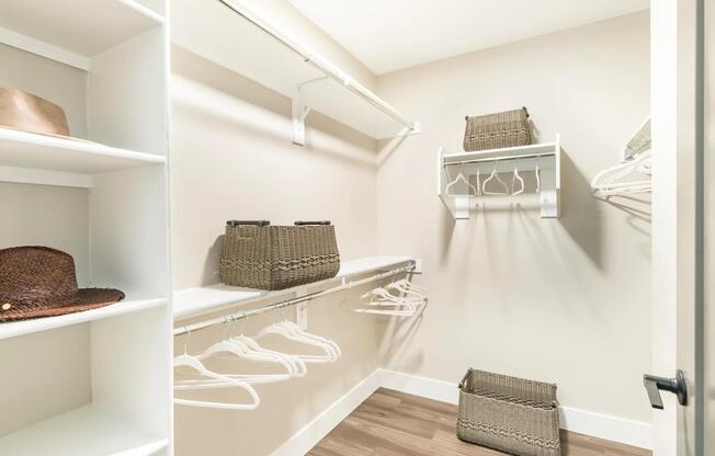 Spacious walk-in closets offer custom shelving and abundant storage, making it easy to keep your wardrobe beautifully organized.