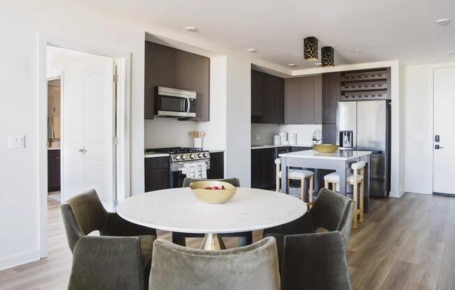 Cook in style with gourmet kitchens, single basin sinks and sleek tile backsplash.