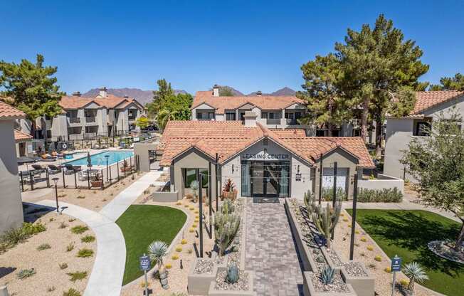 an aerial view of the clubhouse and pool at hideaway apartments in north scottsdale, az